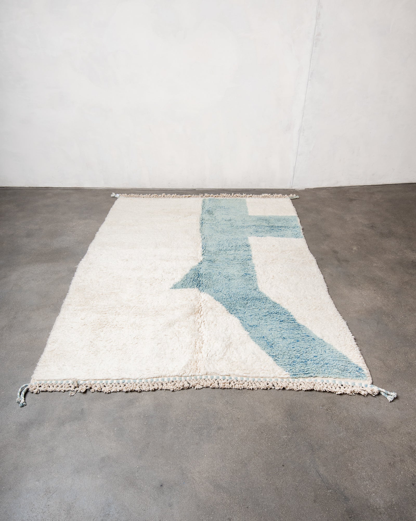 Modern, designer, handcrafted Berber rug from Morocco. Beniourain carpet with beautiful colours and patterns and fluffy wool texture.